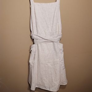 Essue light beige midi dress with bows and pockets